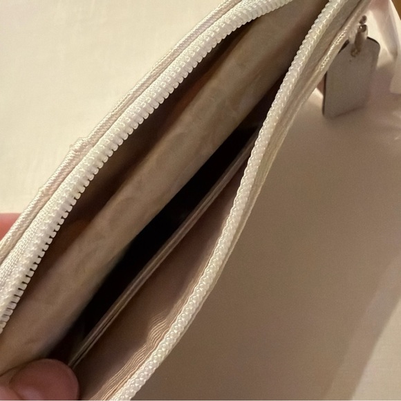 NWT Coach white canvas/leather and Tan Wristlet, matching accessories available